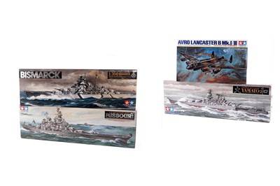 Lot 861 - A collection of three 1:350 scale Tamiya model ship kits; and a 1:48 scale kit