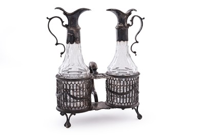 Lot 109 - A George III silver oil and vinegar frame