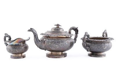 Lot 114 - A late George III silver three piece tea service