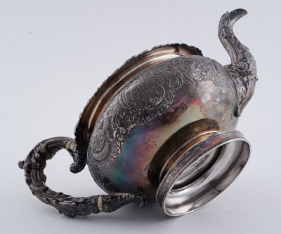 Lot 114 - A late George III silver three piece tea service