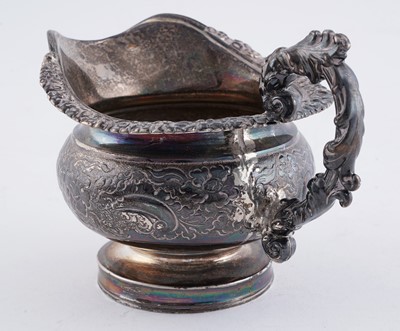 Lot 114 - A late George III silver three piece tea service