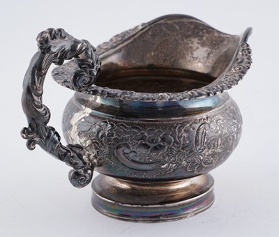 Lot 114 - A late George III silver three piece tea service