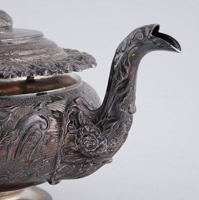 Lot 114 - A late George III silver three piece tea service