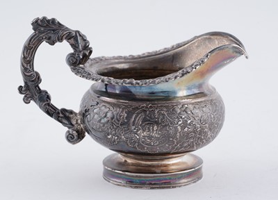 Lot 114 - A late George III silver three piece tea service