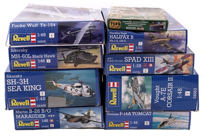 Lot 867 - A collection of nine boxed Revell model kits