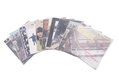 Lot 266 - A small collection of vinyl records including The Beatles