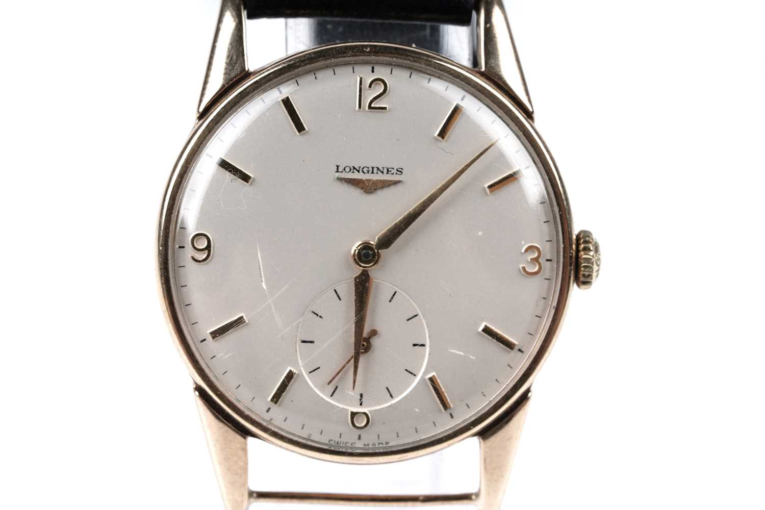 Lot 448 - Longines: a 9ct yellow gold cased manual wind wristwatch