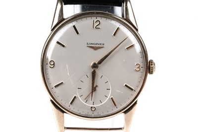 Lot 448 - Longines: a 9ct yellow gold cased manual wind wristwatch