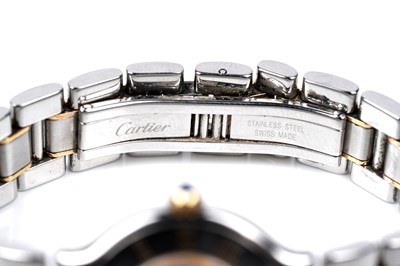 Lot 444 - Must de Cartier 21: a steel and gilt cased lady's quartz wristwatch