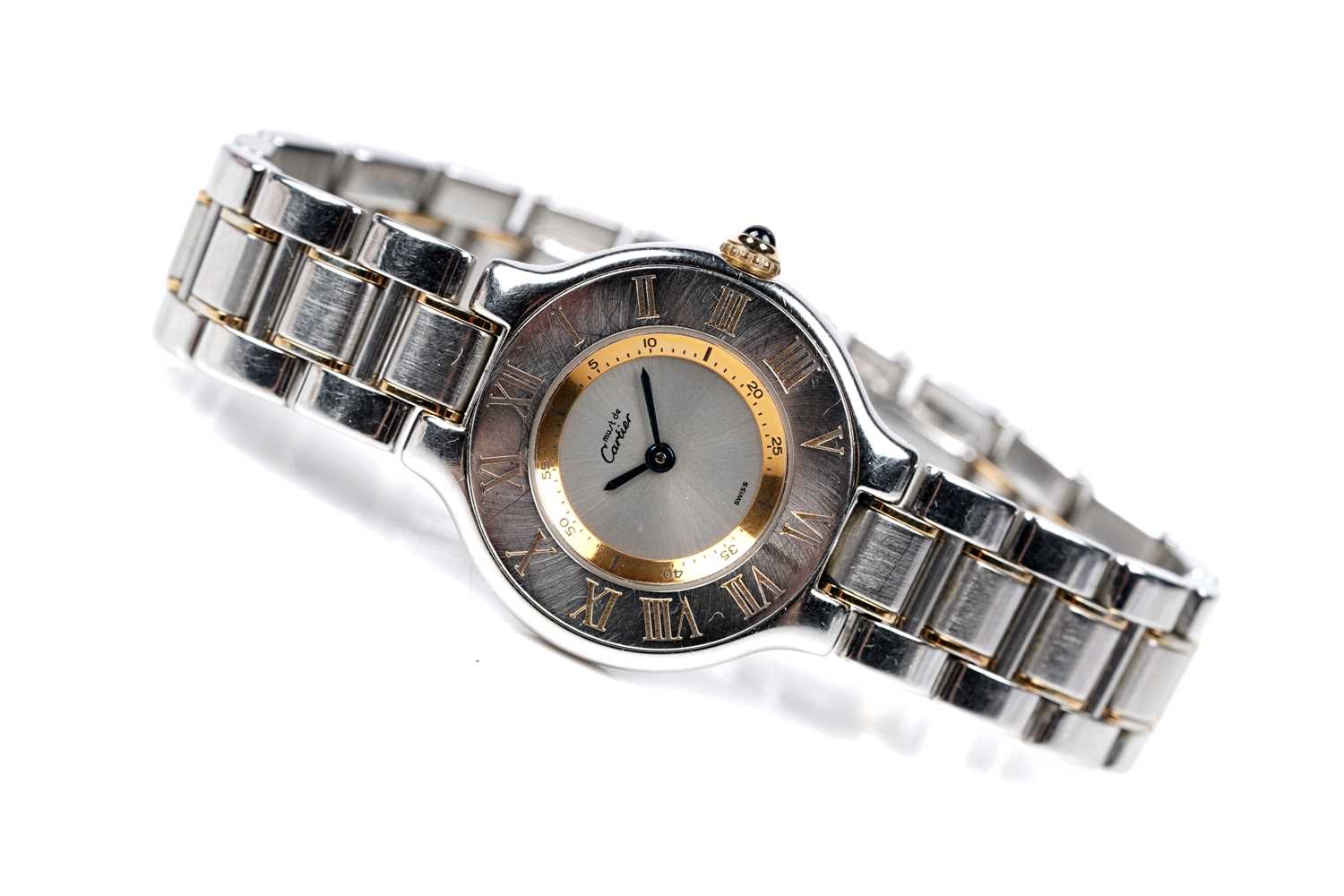 Lot 444 - Must de Cartier 21: a steel and gilt cased lady's quartz wristwatch