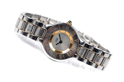 Lot 444 - Must de Cartier 21: a steel and gilt cased lady's quartz wristwatch