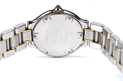 Lot 444 - Must de Cartier 21: a steel and gilt cased lady's quartz wristwatch