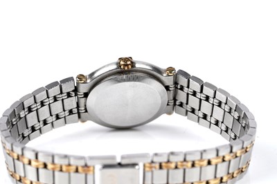 Lot 457 - Gucci: a steel and gilt cased quartz lady's wristwatch