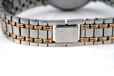 Lot 457 - Gucci: a steel and gilt cased quartz lady's wristwatch
