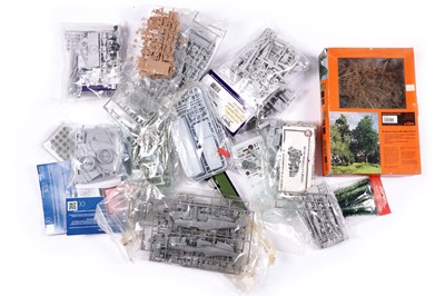 Lot 885 - A collection of bagged models and model accessories