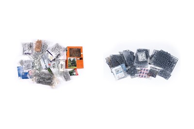 Lot 394 - A collection of bagged models and model accessories
