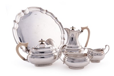 Lot 15 - A George V silver four piece tea service; and an Elizabeth II silver salver