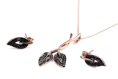 Lot 68 - A contemporary black diamond leaf pattern earring and necklace set