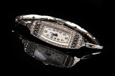 Lot 505 - An 18ct white gold and diamond set lady's cocktail watch