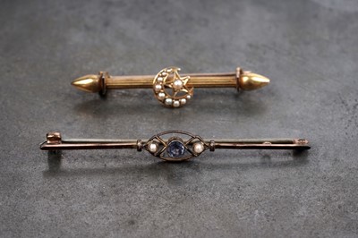 Lot 56 - A Victorian Etruscan Revival bar brooch; and an Edwardian Art Deco sapphire brooch