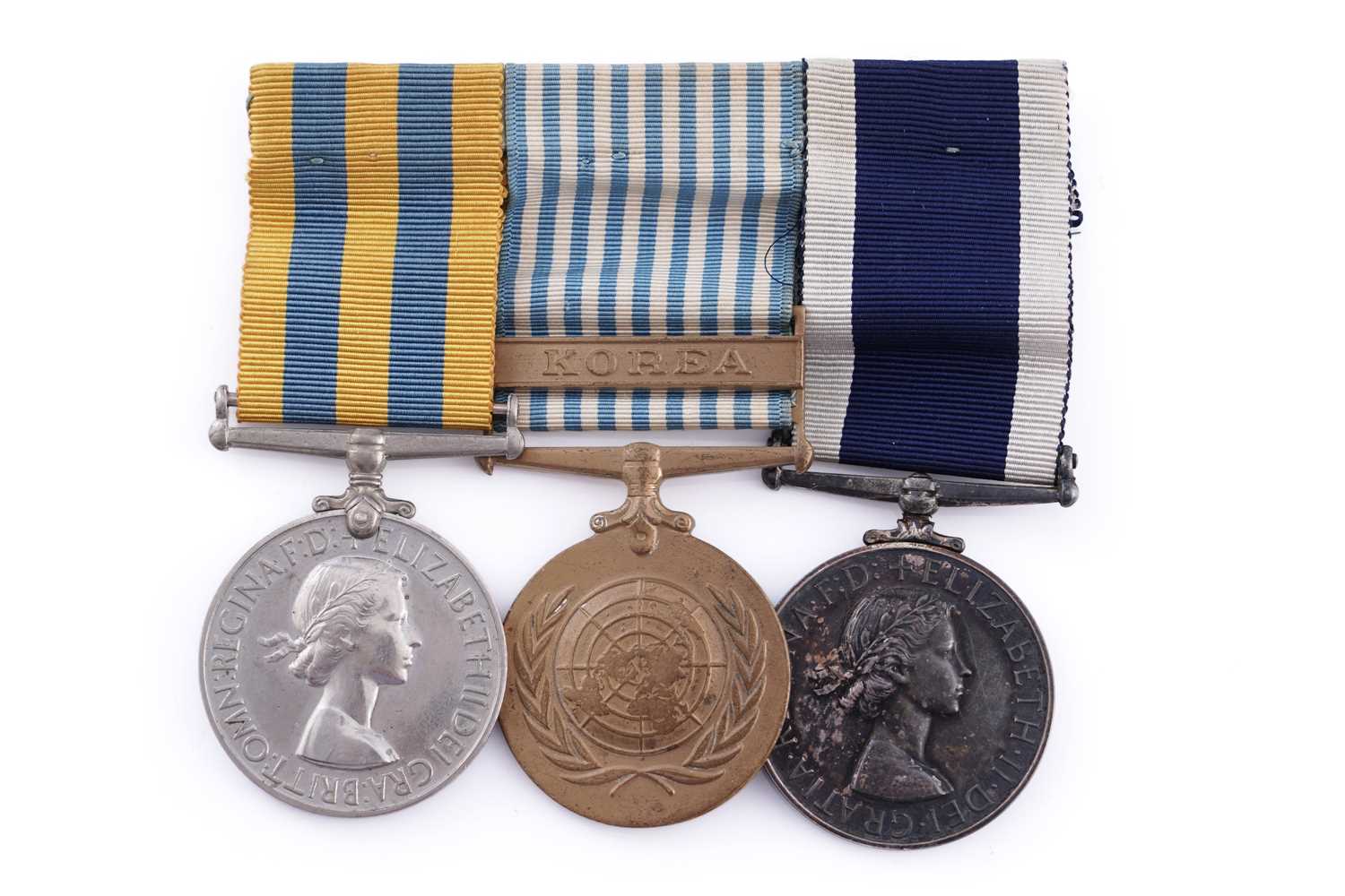 Lot 8 - A group of three Korea and LSGC medals