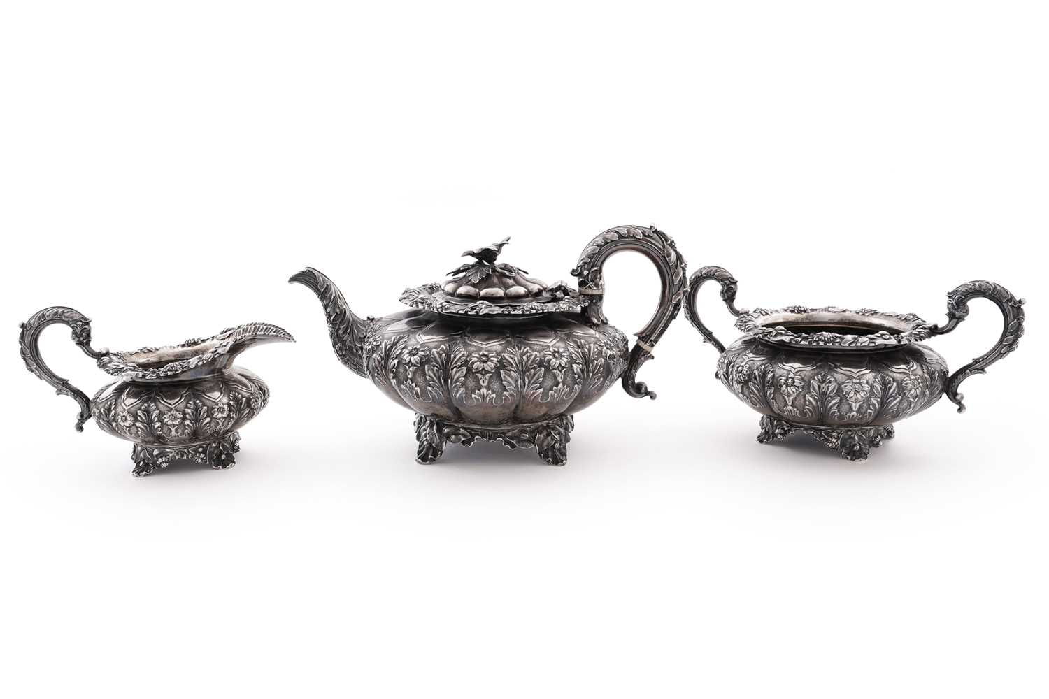 Lot 115 - A late George IV silver three-piece tea service
