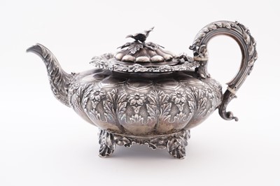 Lot 115 - A late George IV silver three-piece tea service