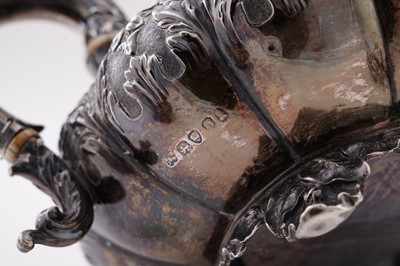 Lot 115 - A late George IV silver three-piece tea service