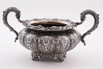 Lot 115 - A late George IV silver three-piece tea service