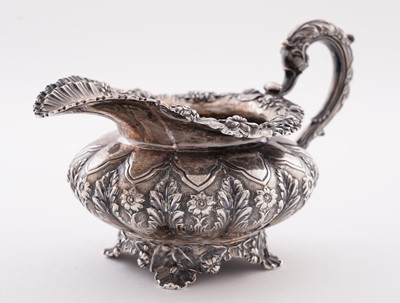 Lot 115 - A late George IV silver three-piece tea service