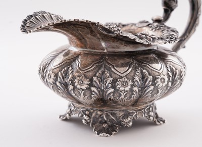Lot 115 - A late George IV silver three-piece tea service