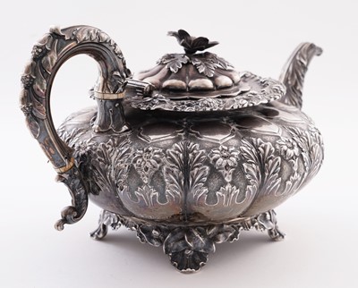 Lot 115 - A late George IV silver three-piece tea service