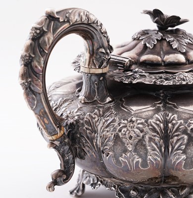 Lot 115 - A late George IV silver three-piece tea service