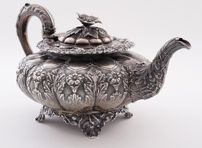 Lot 115 - A late George IV silver three-piece tea service