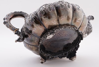 Lot 115 - A late George IV silver three-piece tea service