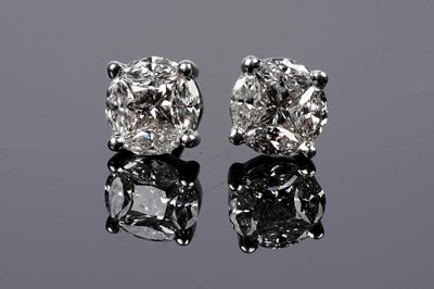 Lot 545 - A pair of diamond earrings