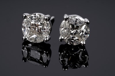 Lot 545 - A pair of diamond earrings