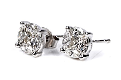 Lot 545 - A pair of diamond earrings