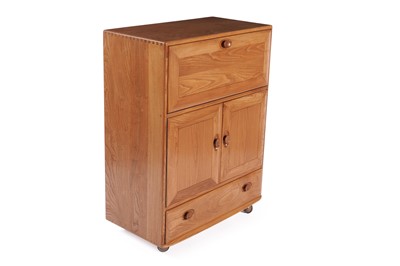 Lot 524 - Lucian Ercolani for Ercol: a model 469 ‘Windsor’ elm cabinet