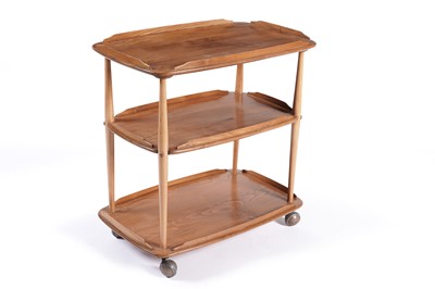 Lot 590 - Ercol: an Ercol model 458 ‘Windsor’ elm and beech three tier trolley
