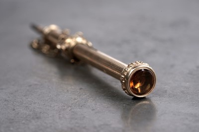 Lot 158 - An antique citrine fob or chatelaine propelling pencil