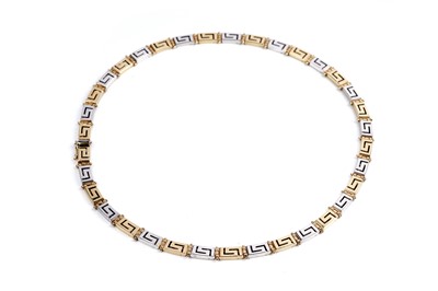 Lot 551 - An 18ct yellow and white gold Greek-Key pattern necklace