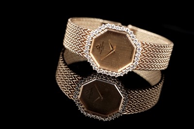 Lot 442 - Baume & Mercier, Geneve: an 18ct yellow gold cased lady's cocktail watch