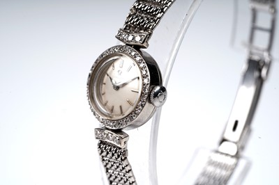 Lot 431 - Omega: an 18ct white gold cased lady's cocktail watch