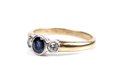 Lot 166 - A contemporary sapphire and diamond ring