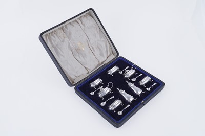 Lot 368 - An Edward VII/George V cased silver condiment set