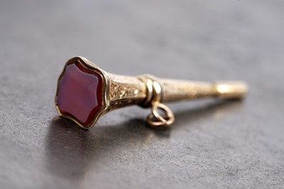 Lot 115 - A 19th Century yellow-metal watch key