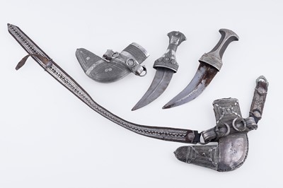 Lot 69 - Two Omani janbiyya or khanjar