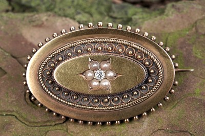 Lot 6 - A Victorian Etruscan Revival diamond and pearl brooch