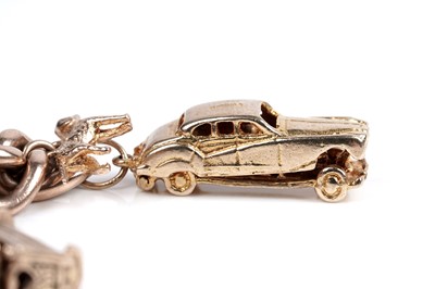 Lot 109 - A 9ct gold curb-link charm bracelet